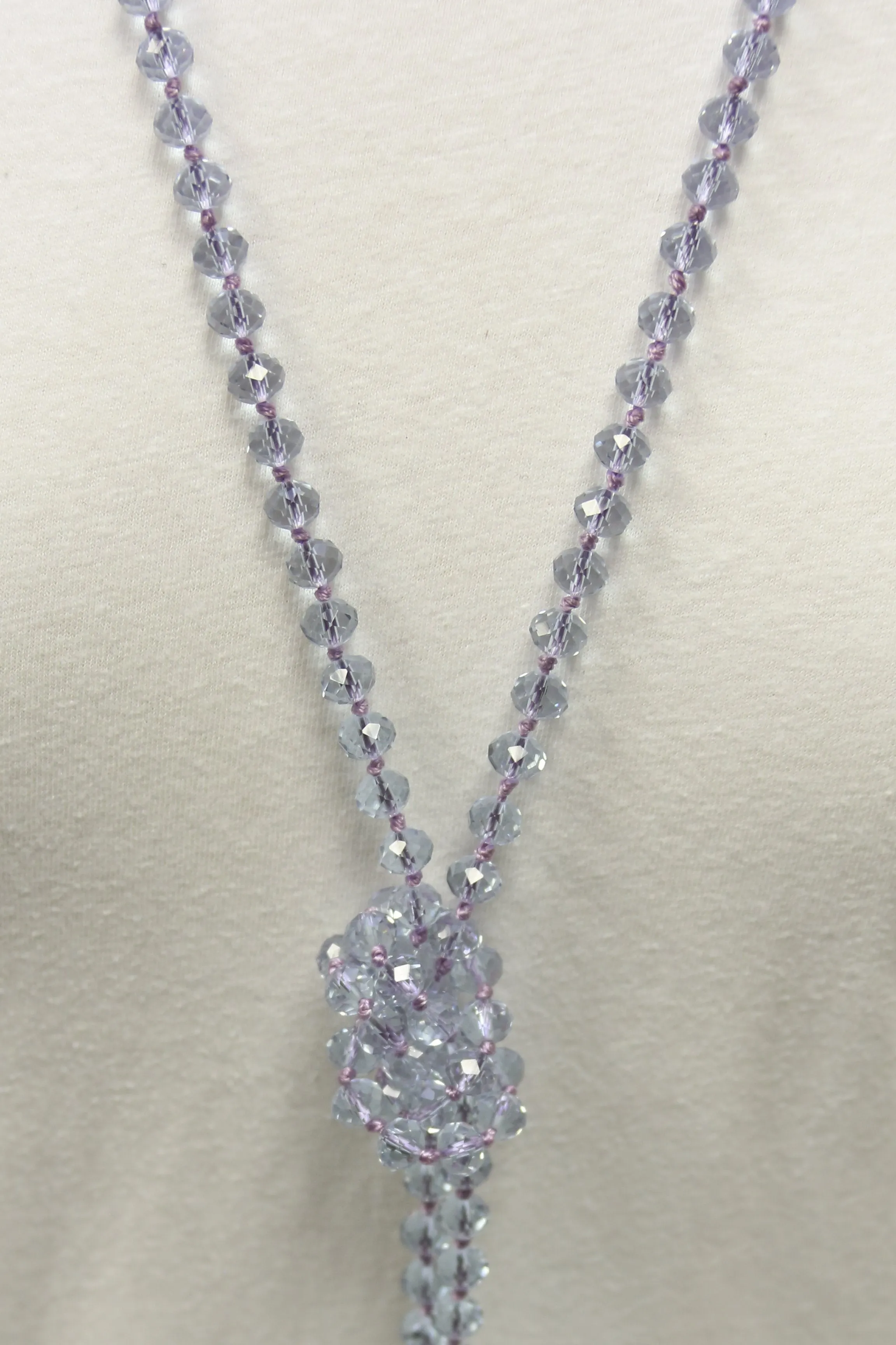NK-2244 CLEAR LIGHT PUR 60" hand knotted glass bead necklace