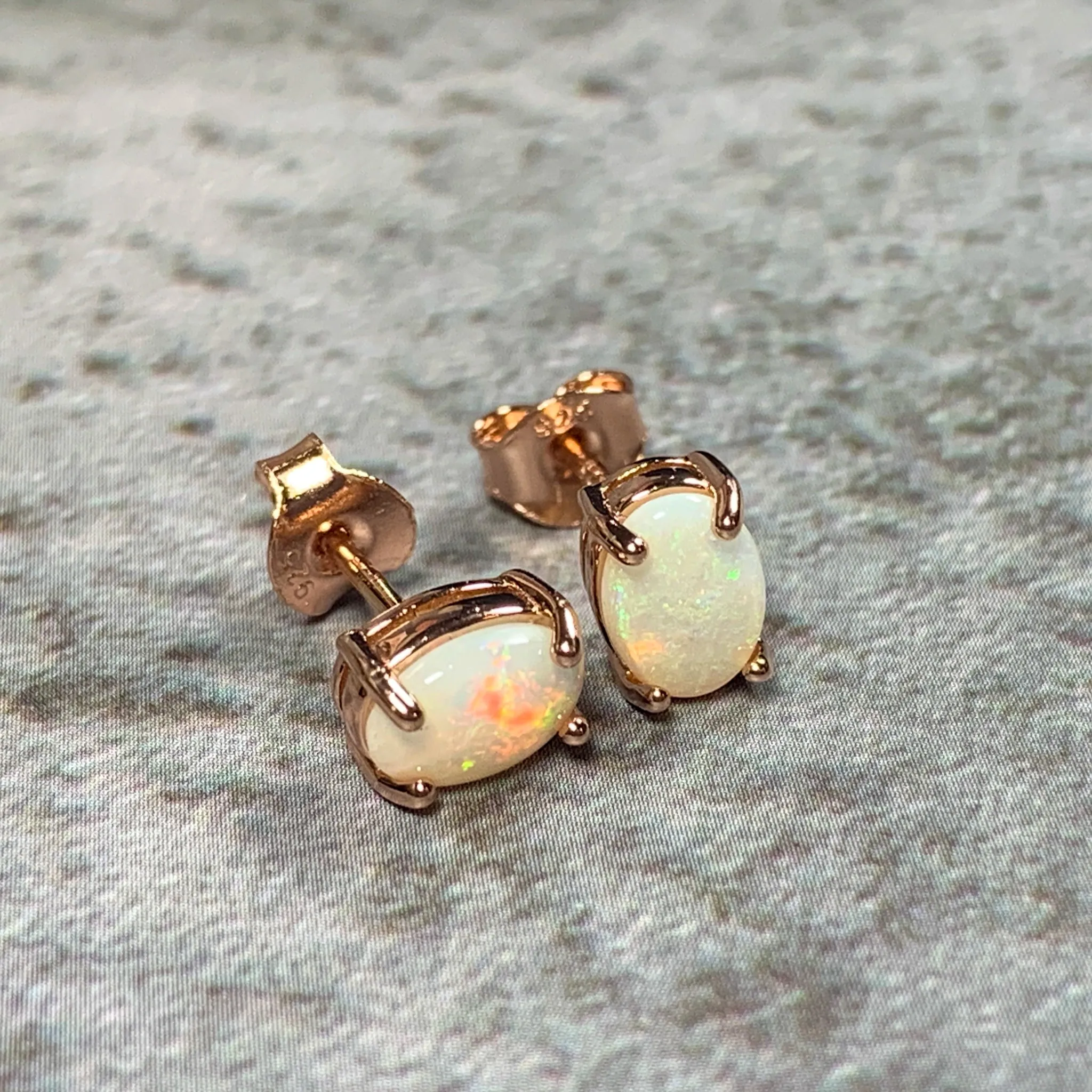 Rose Gold plated silver 7x5mm White Opal studs